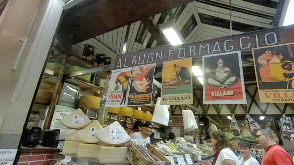 Cheese and food stall at the Mercato delle Erbe in Bologna, celebrating local food culture