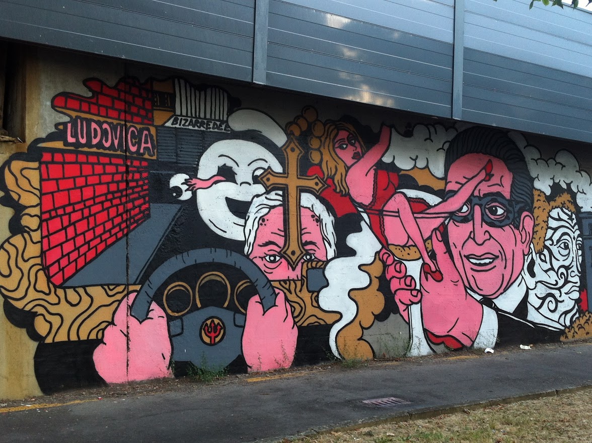 Street art mural on a building wall in Emilia-Romagna